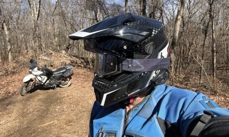 Leatt 9.5 Carbon helmet with Velocity 4.5 Iriz Goggles (side view)